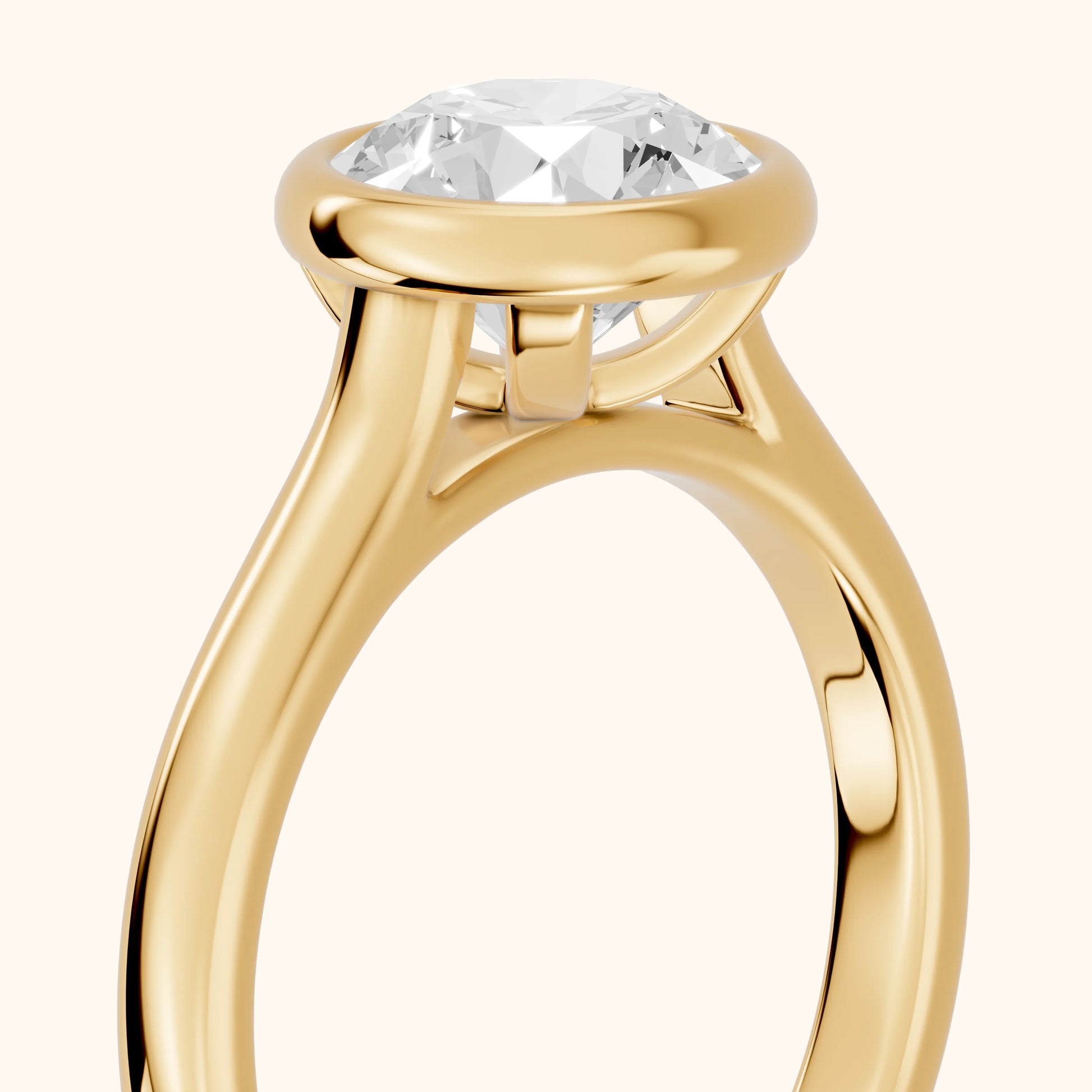 Jolie Bezel Solitaire Round Diamond Engagement Ring in Yellow Gold - slant-view.webp