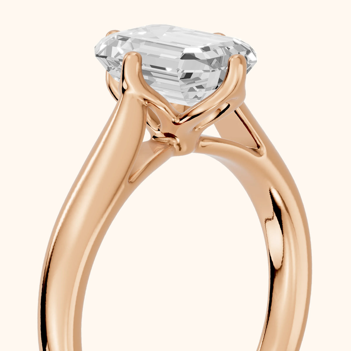 Edwina Crossover Solitaire Emerald Diamond Engagement Ring in Rose Gold - slant-view.webp