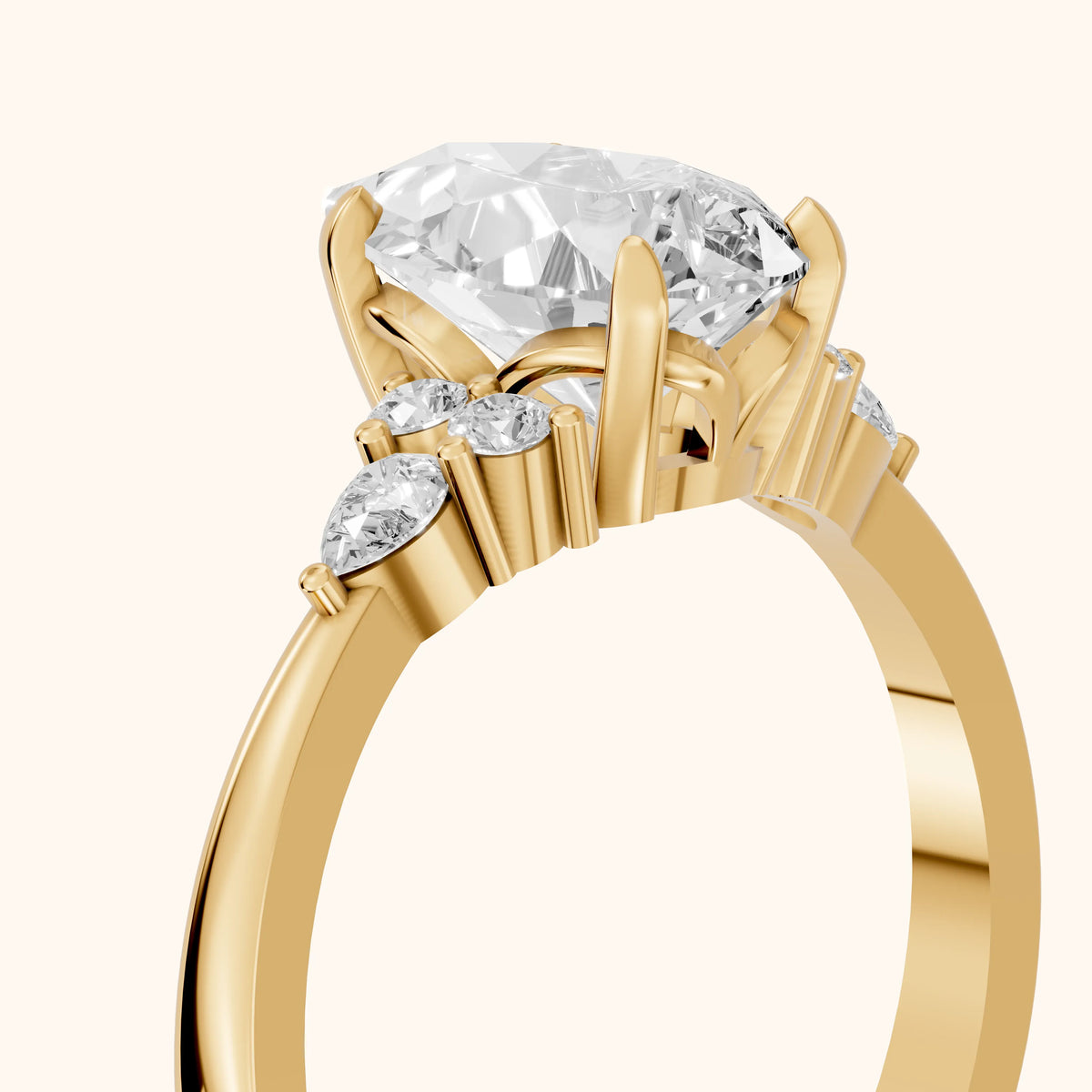 Amelia Three Stone Pear Diamond Engagement Ring in Yellow Gold - slant-view.webp