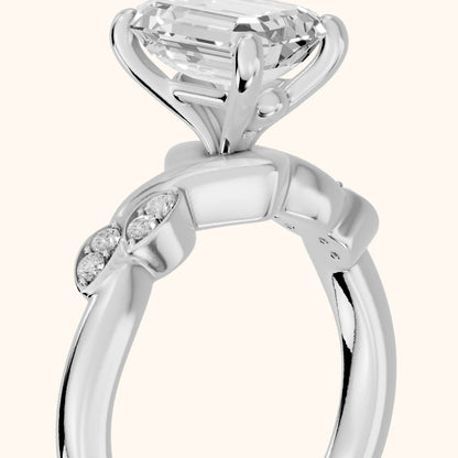 Robin Leaf Twist Emerald Diamond Engagement Ring in Platinum - slant-view.webp