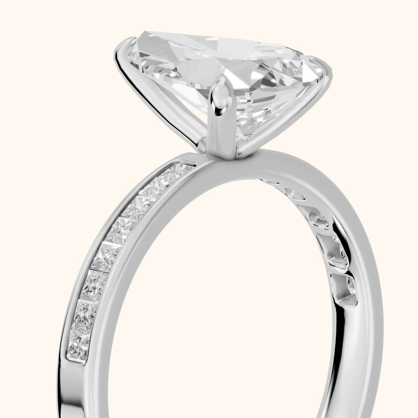 Maren Sidestone Channel Set Pear Diamond Engagement Ring in White Gold - slant-view.webp