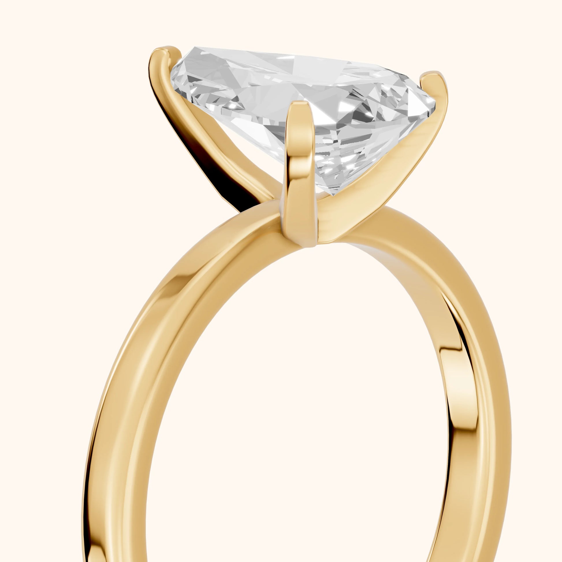Liana Solitaire Claw Prong Pear Diamond Engagement Ring in Yellow Gold - slant-view.webp