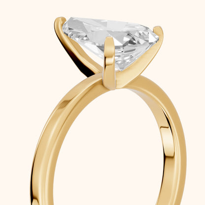Liana Solitaire Claw Prong Pear Diamond Engagement Ring in Yellow Gold - slant-view.webp