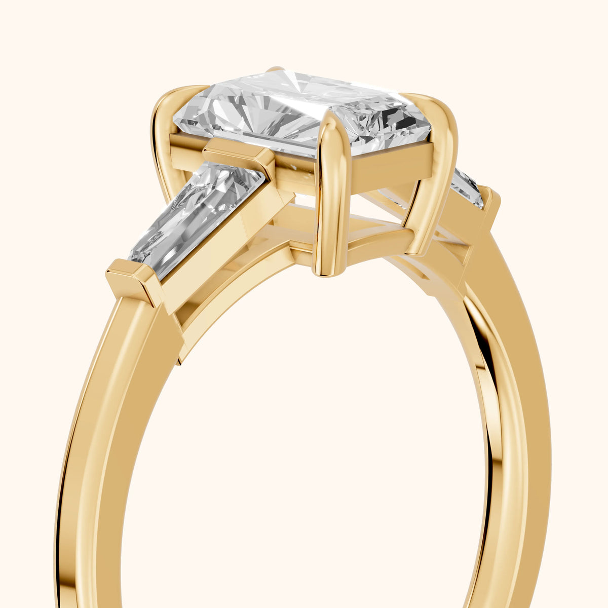 Winnie Three-Stone Radiant Diamond Engagement Ring in Yellow Gold - slant-view.webp