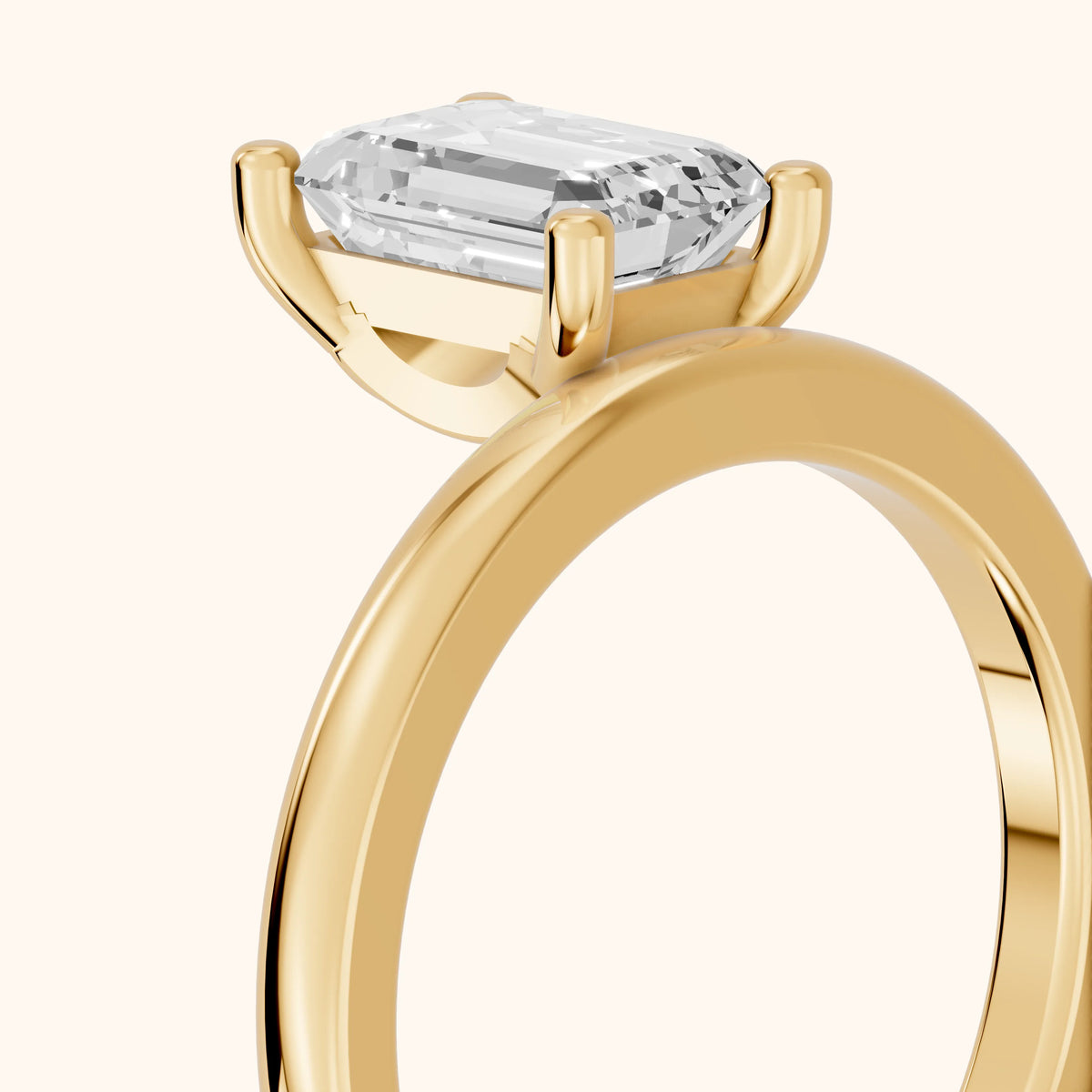 Maisie Four Prong Solitaire Emerald Diamond Engagement Ring in Yellow Gold - slant-view.webp