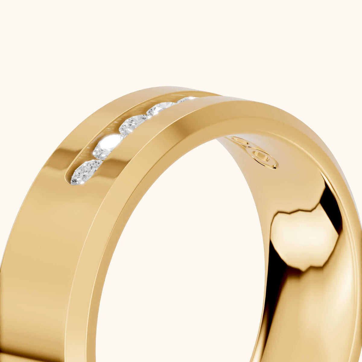 Reva Channel Set Round Diamond Wedding Band in Yellow Gold - slant-view