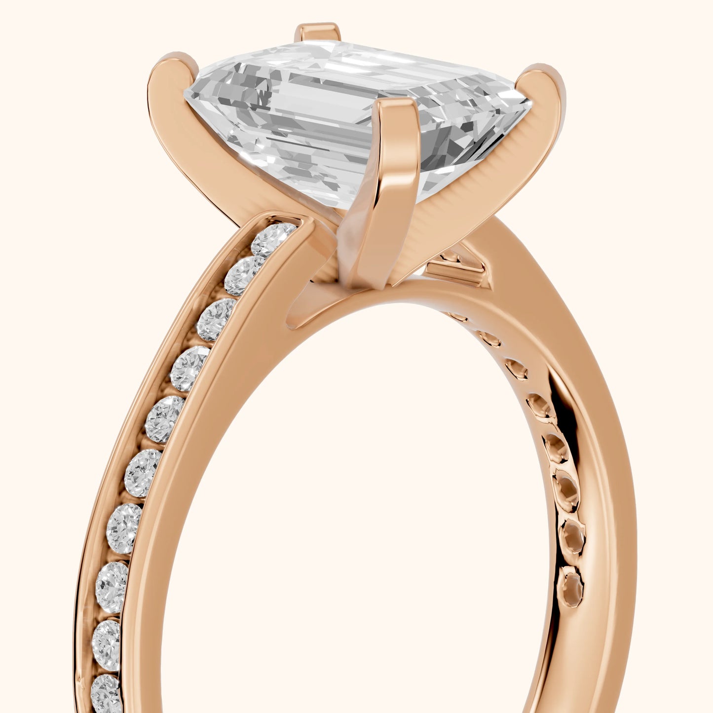 Tessa Solitaire Channel Set Emerald Diamond Engagement Ring in Rose Gold - slant-view.webp