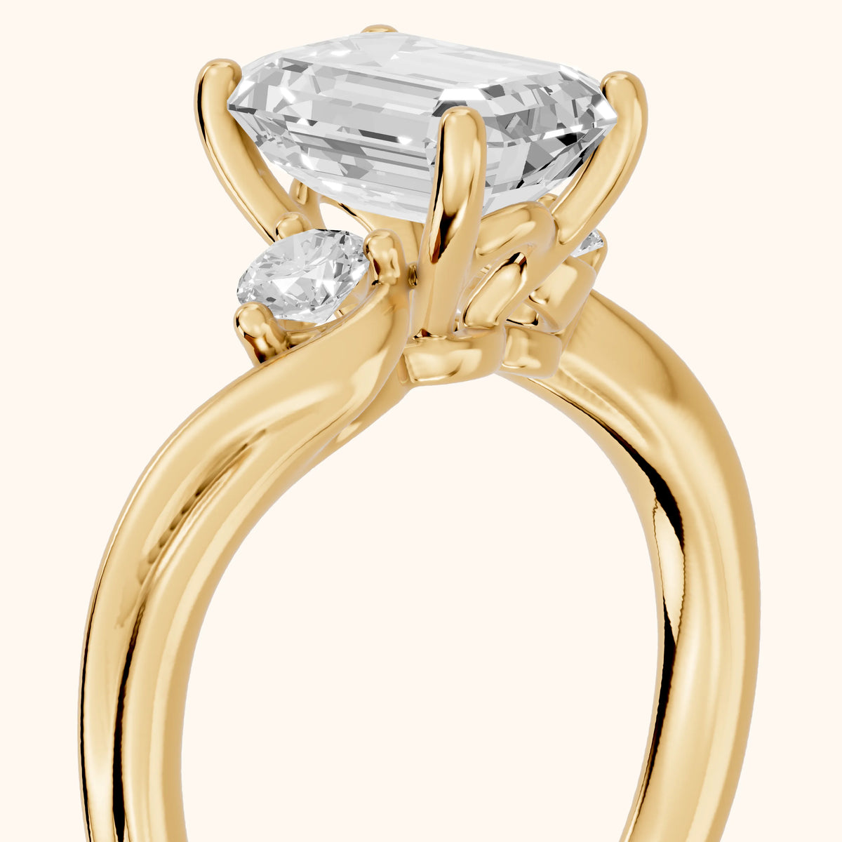 Rena Bypass Three-Stone Emerald Diamond Engagement Ring in Yellow Gold - slant-view.webp