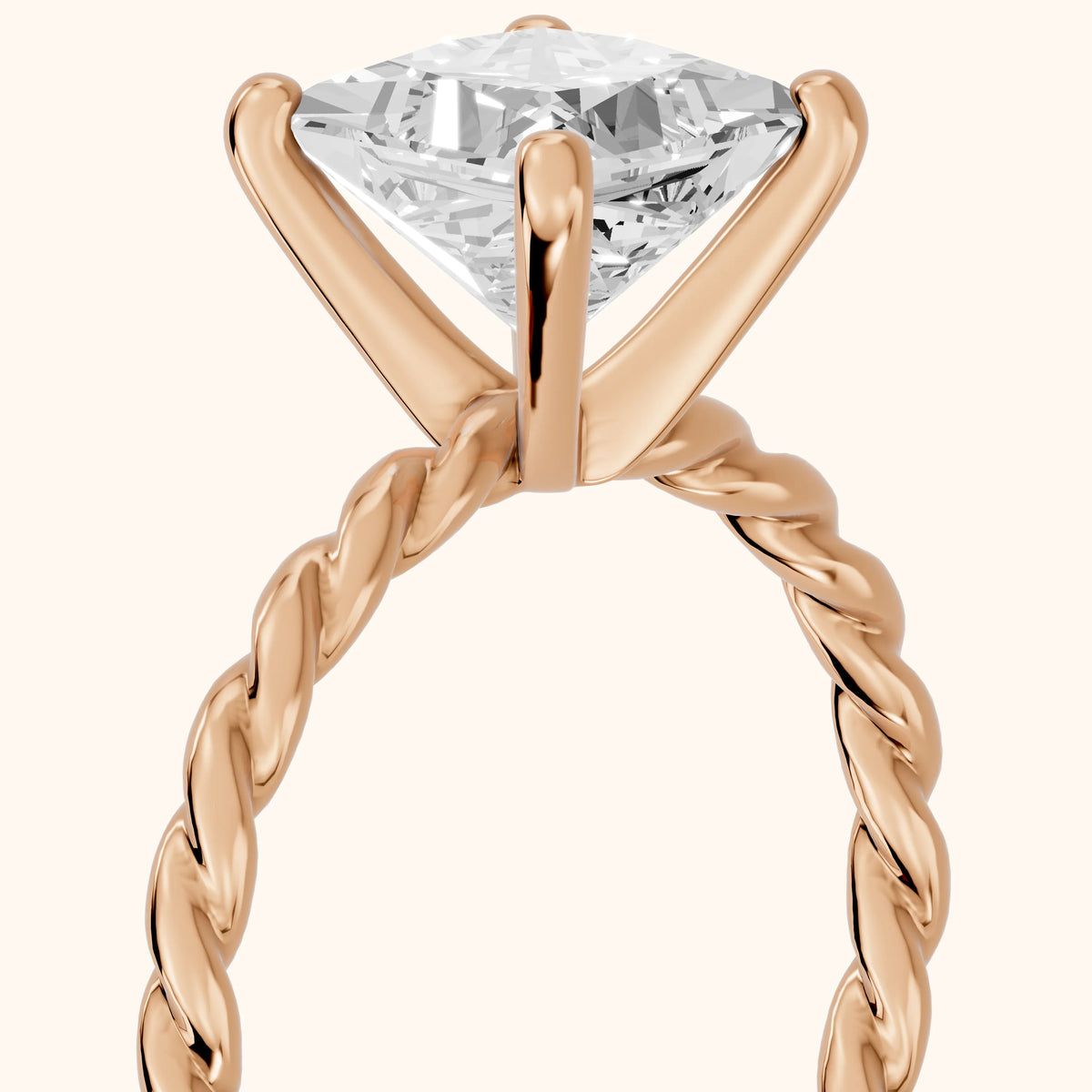 Robyn Twist Solitaire Princess Diamond Engagement Ring in Rose Gold - slant-view.webp