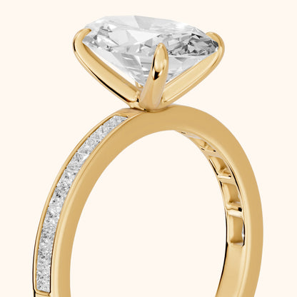 Freja Channel Set Oval Diamond Engagement Ring in Yellow Gold - slant-view.webp