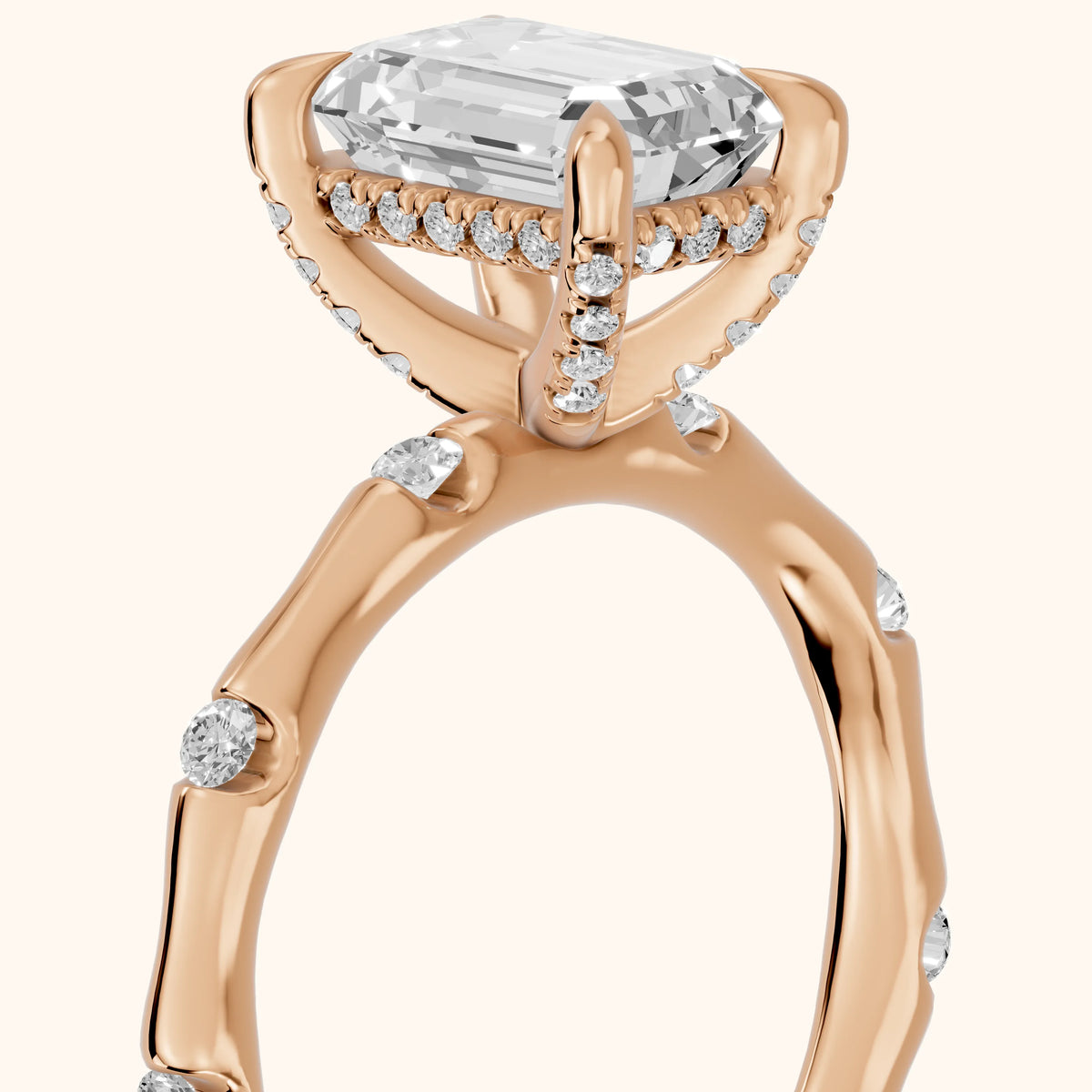 Liv Hidden Halo Emerald Diamond Engagement Ring in Rose Gold - slant-view.webp