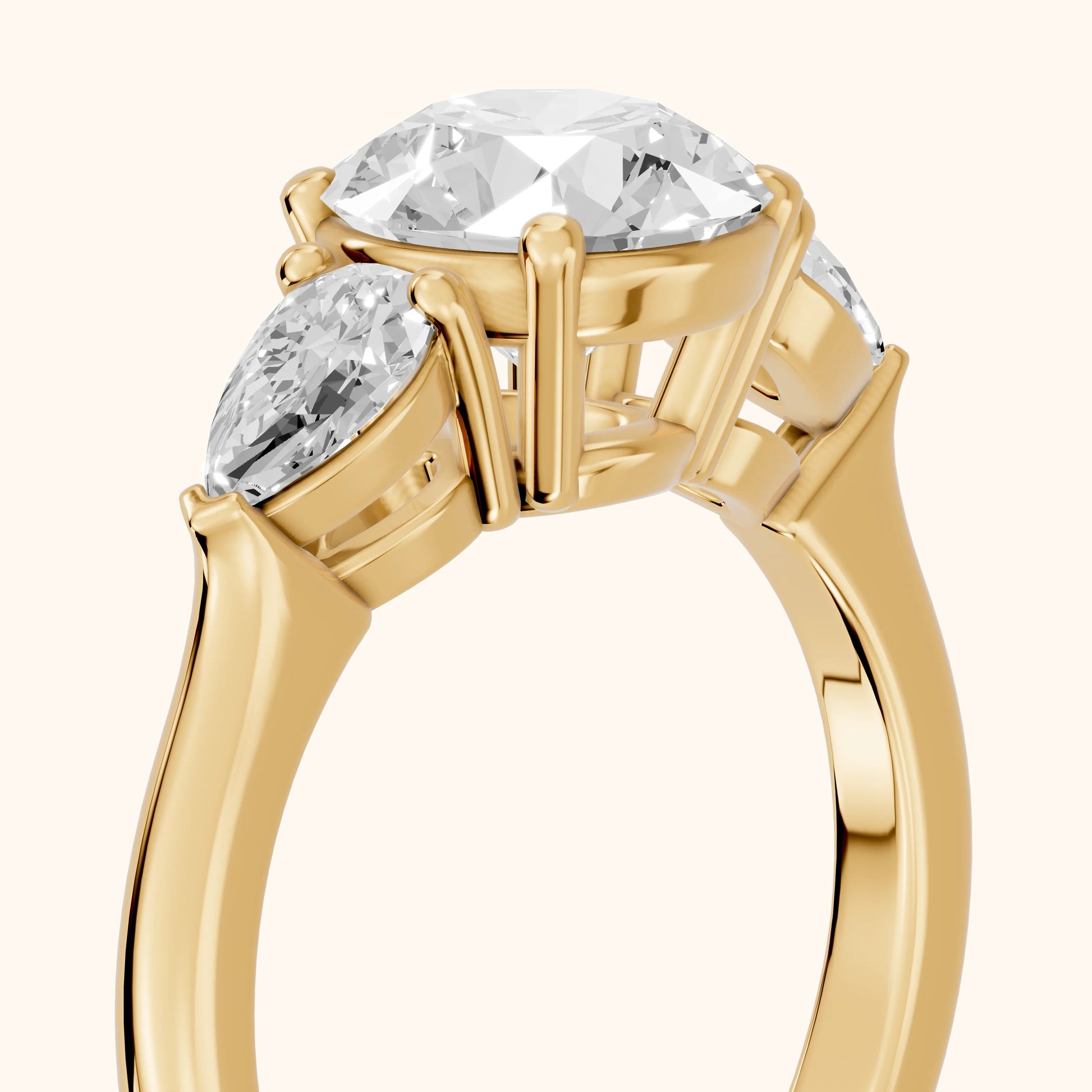 Mirabel Three-Stone Round Diamond Engagement Ring in Yellow Gold - slant-view.webp