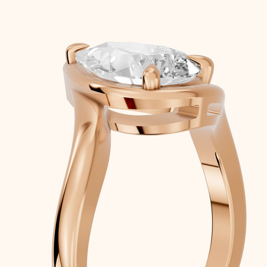 Tabitha Bypass Partial Bezel Pear Diamond Engagement Ring in Rose Gold - slant-view.webp