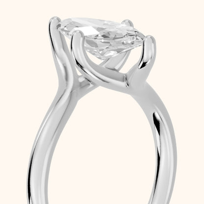 Clio Bypass Solitaire Marquise Diamond Engagement Ring in Platinum - slant-view.webp