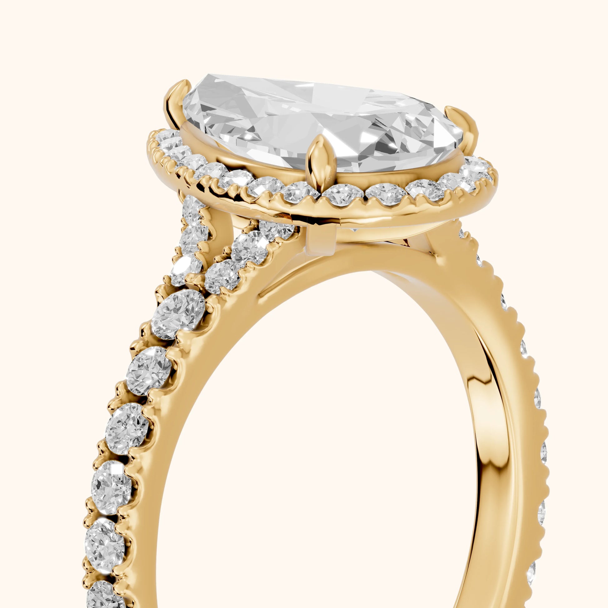 Bella Halo Pavé Pear Diamond Engagement Ring in Yellow Gold - slant-view.webp