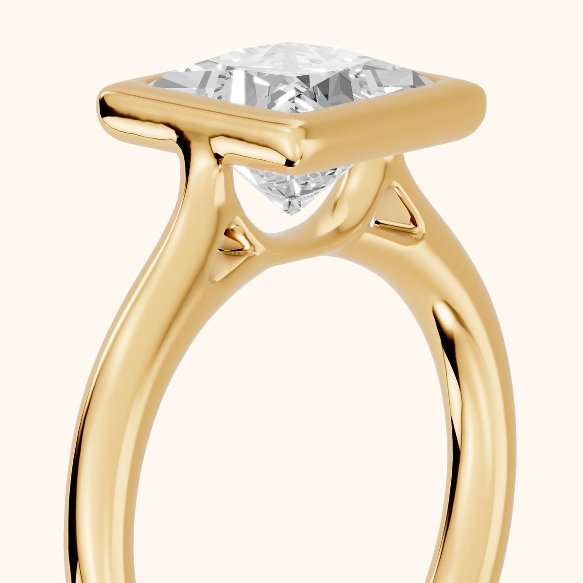 Isla Bezel Solitaire Princess Diamond Engagement Ring in Yellow Gold - slant-view.webp