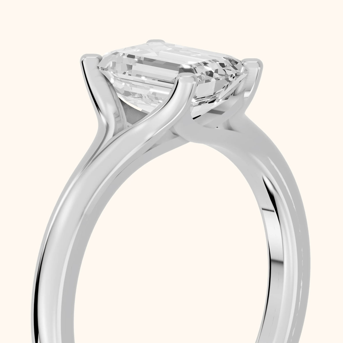 Nell Split Shank Solitaire Emerald Diamond Engagement Ring in White Gold - slant-view.webp