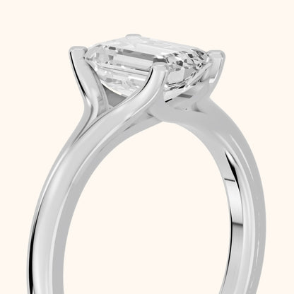 Nell Split Shank Solitaire Emerald Diamond Engagement Ring in White Gold - slant-view.webp