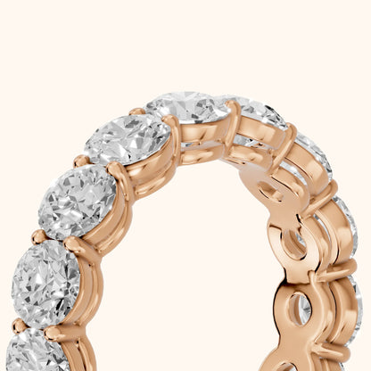 Larissa Shared Prong Round Diamond Eternity Band in Rose Gold - slant-view