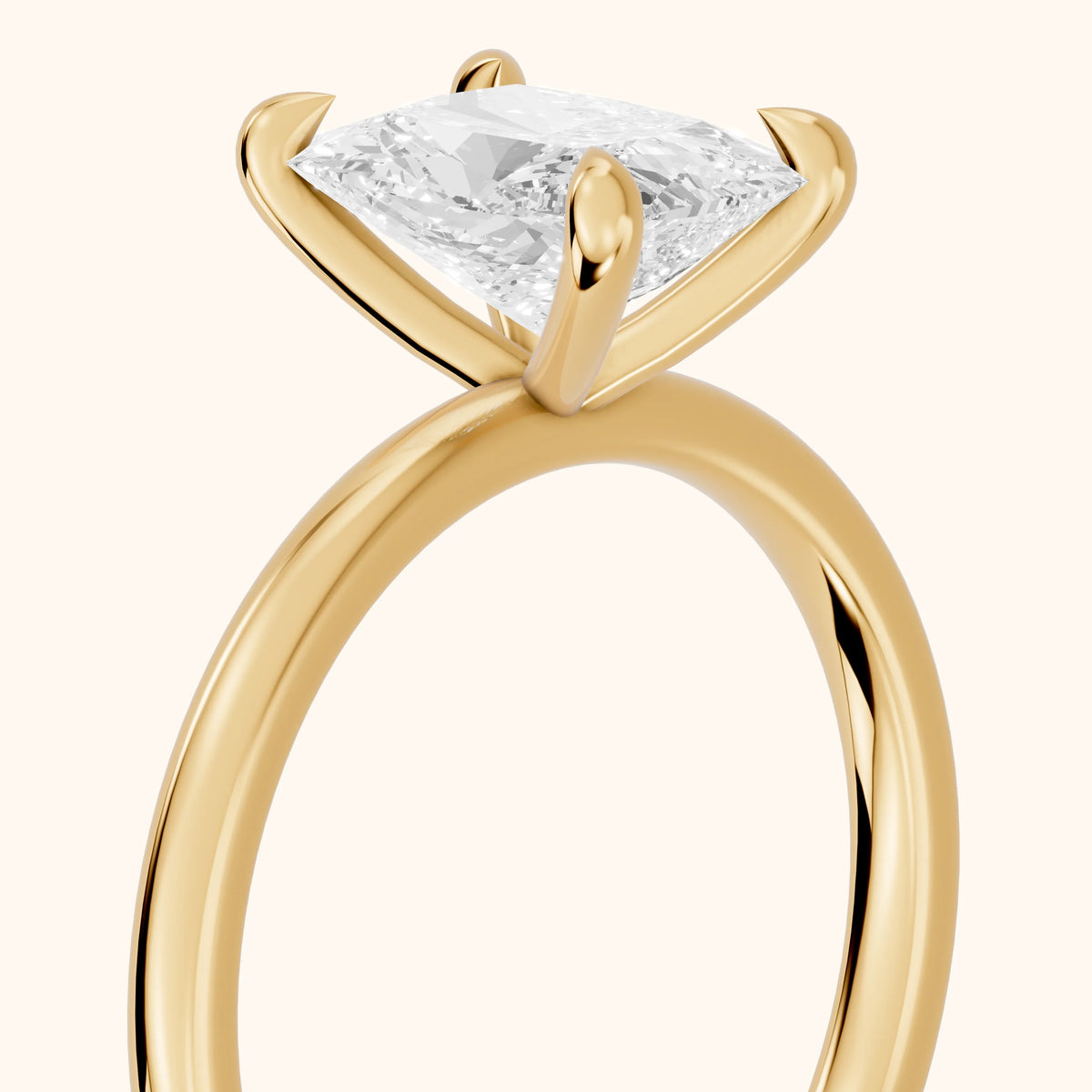 Nella Petite Solitaire Radiant Diamond Engagement Ring in Yellow Gold - slant-view.webp