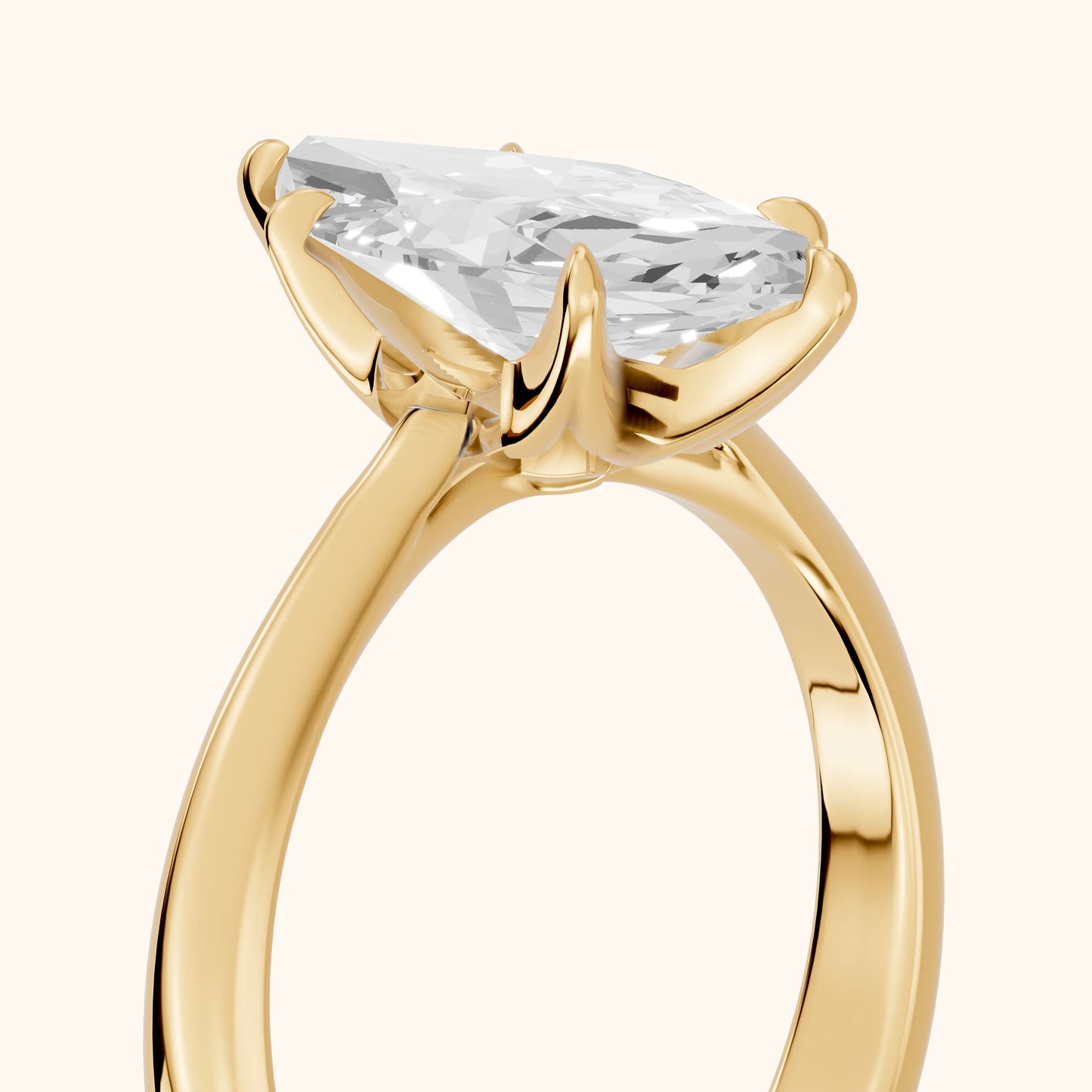 Evie Solitaire Six-Prong Marquise Diamond Engagement Ring in Yellow Gold - slant-view.webp