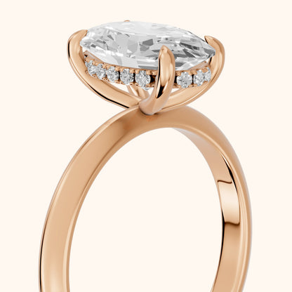 Amaya Hidden Halo Oval Diamond Ring in Rose Gold - slant-view.webp