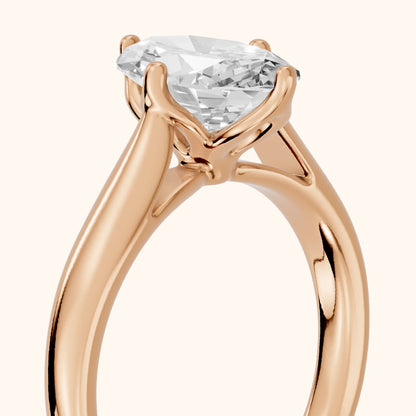 Edwina Crossover Solitaire Oval Diamond Engagement Ring in Rose Gold - slant-view.webp