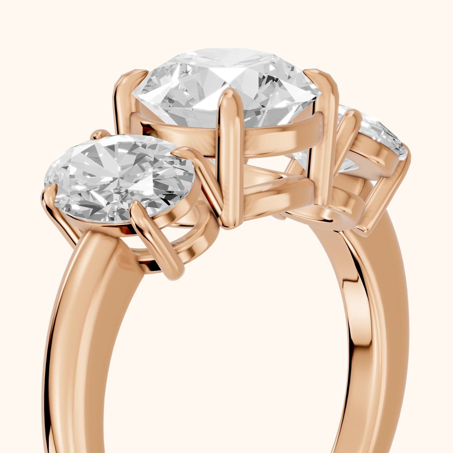 Lila Three-Stone Round Diamond Ring in Rose Gold - slant-view.webp