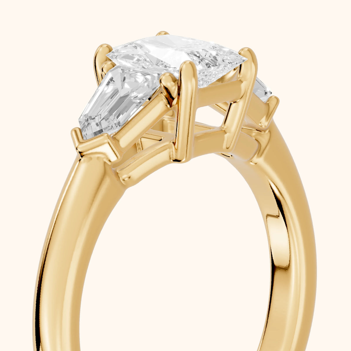 Dorothea Baguette Three-Stone Radiant Diamond Engagement Ring in Yellow Gold - slant-view.webp