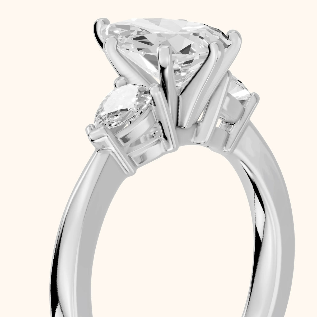 Amabel Three-Stone Pear Diamond Engagement Ring in Platinum - slant-view.webp