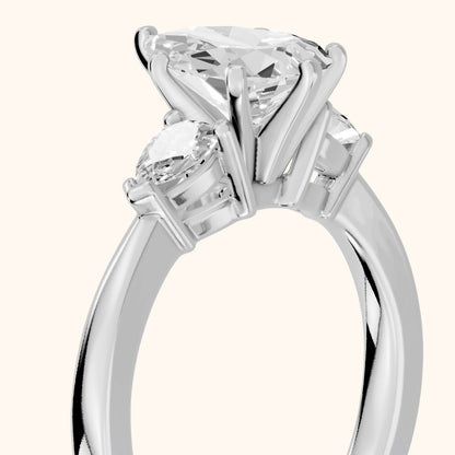 Amabel Three-Stone Pear Diamond Engagement Ring in Platinum - slant-view.webp