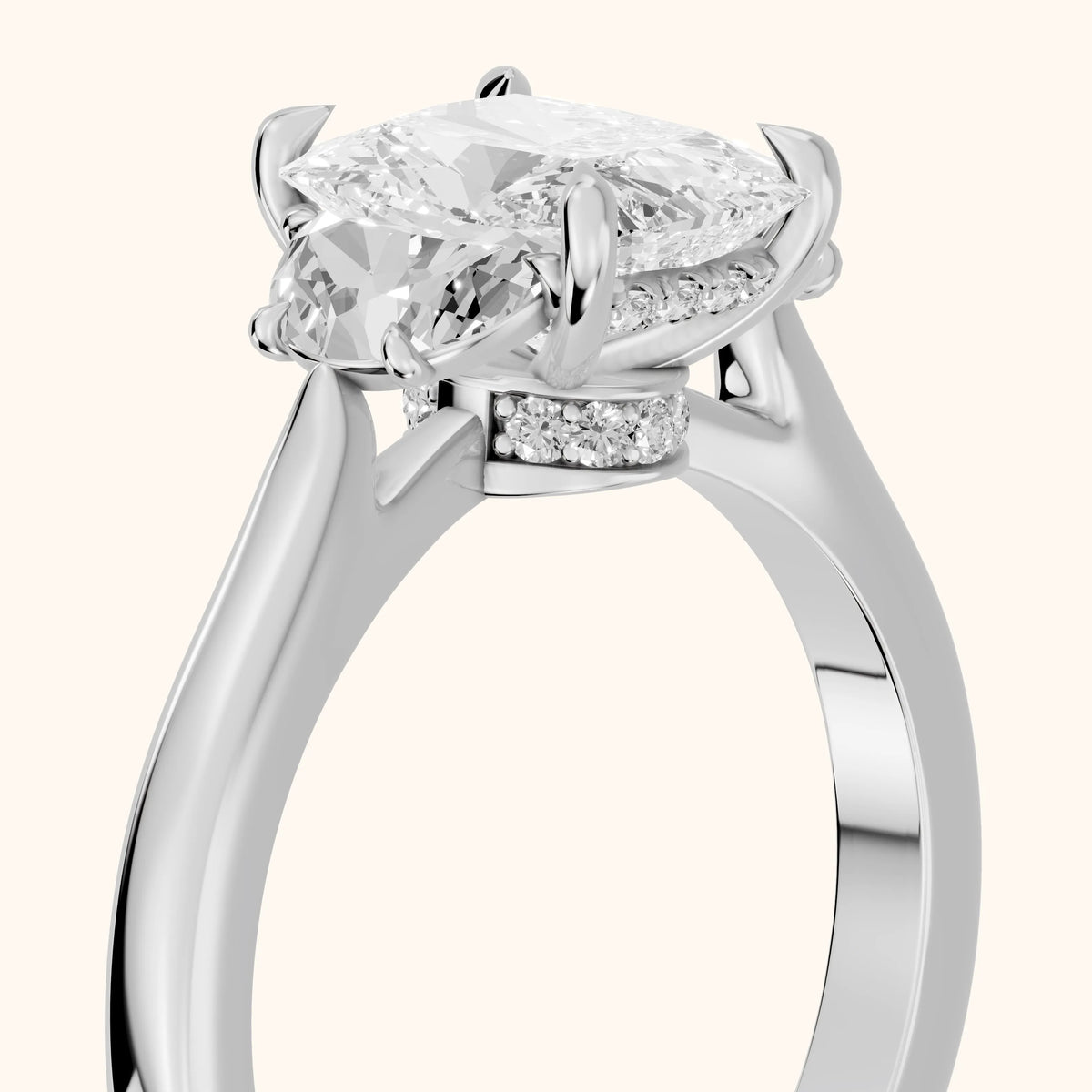 Romy Three-Stone Radiant Diamond Engagement Ring in Platinum - slant-view.webp