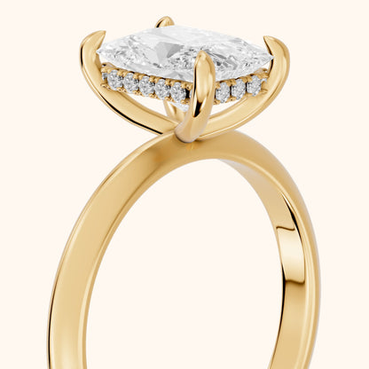 Amaya Hidden Halo Radiant Diamond Engagement Ring in Yellow Gold - slant-view.webp