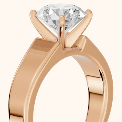 Susannah Wide Band Solitaire Round Diamond Engagement Ring in Rose Gold - slant-view.webp