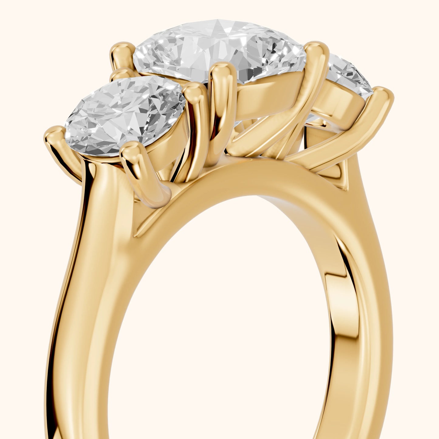 Callie Three-Stone Trellis Cushion Diamond Ring in Yellow Gold - slant-view.webp