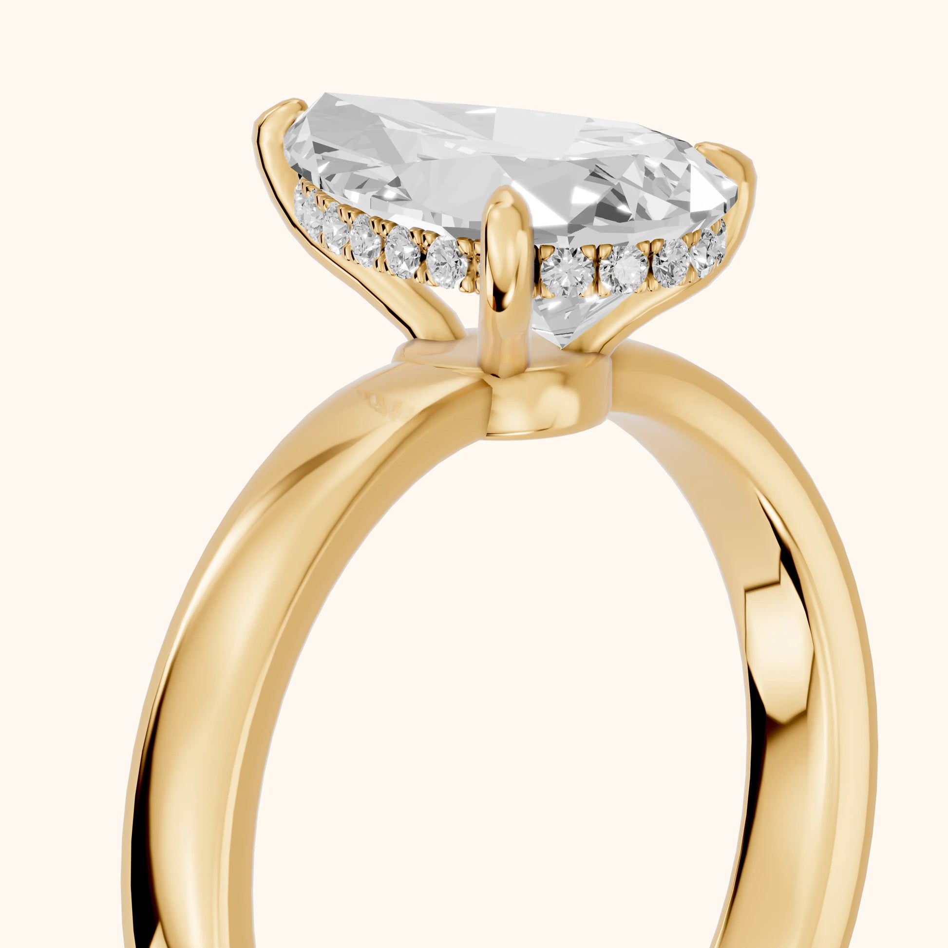 Lara Hidden Halo Pear Diamond Engagement Ring in Yellow Gold - slant-view.webp