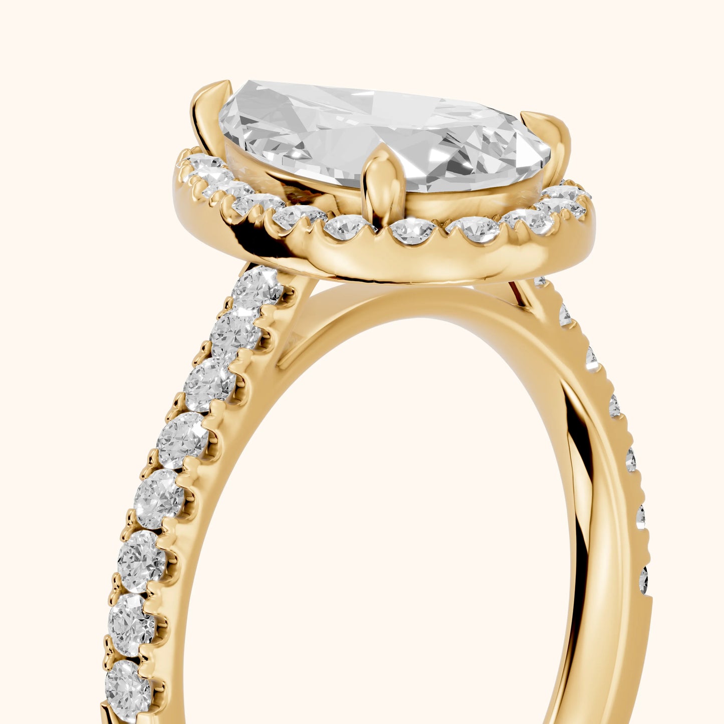 Amara Halo Claw Prong Pear Diamond Ring in Yellow Gold - slant-view.webp
