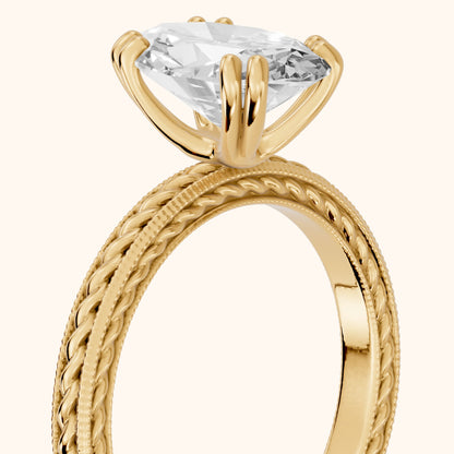 Lacey Rope Solitaire Oval Diamond Engagement Ring in Yellow Gold - slant-view.webp