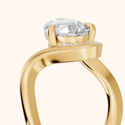 Empire Solitaire Bypass Pear Diamond Engagement Ring in Yellow Gold - slant-view.webp