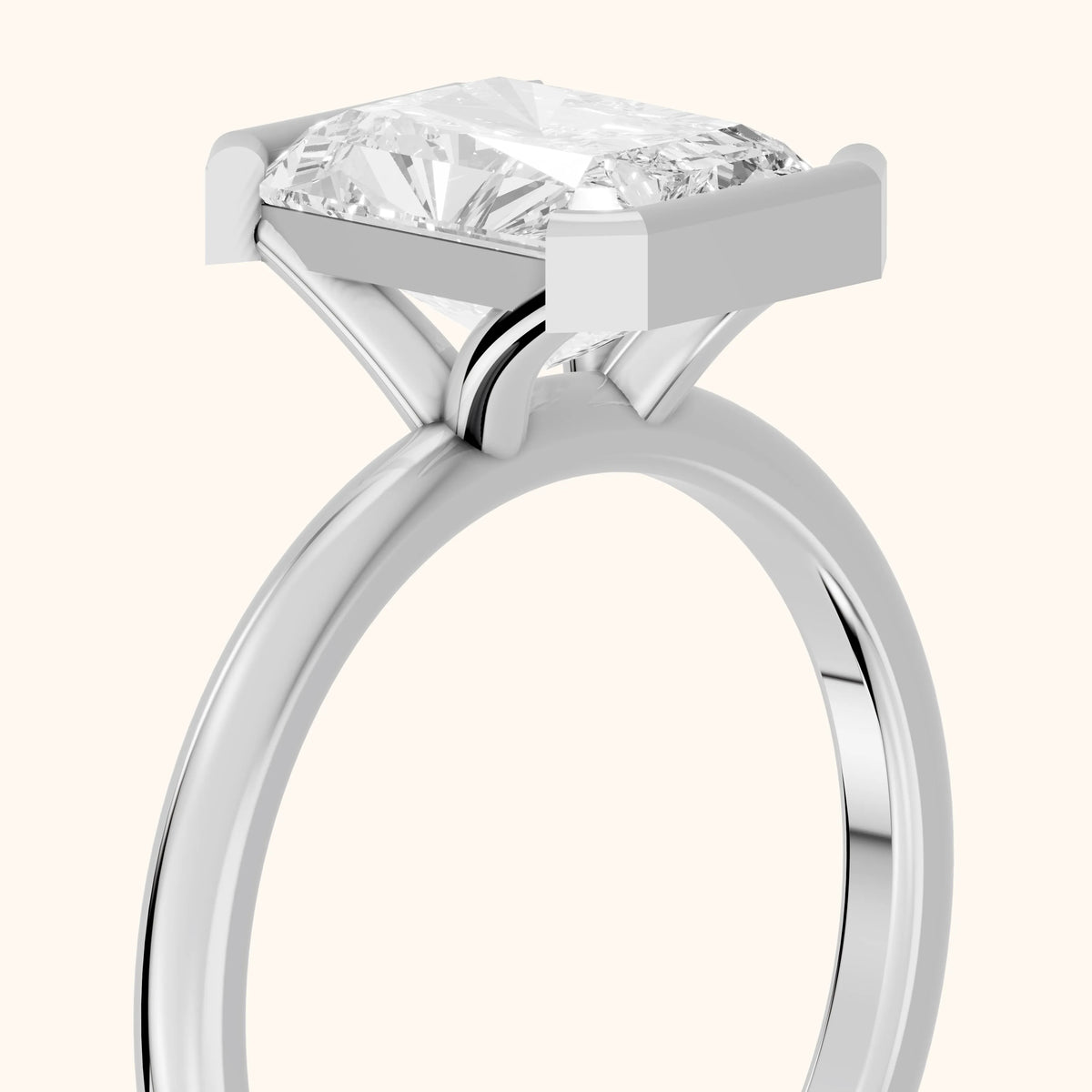 Bedford Half Bezel Solitaire Radiant Diamond Engagement Ring in Platinum - slant-view.webp
