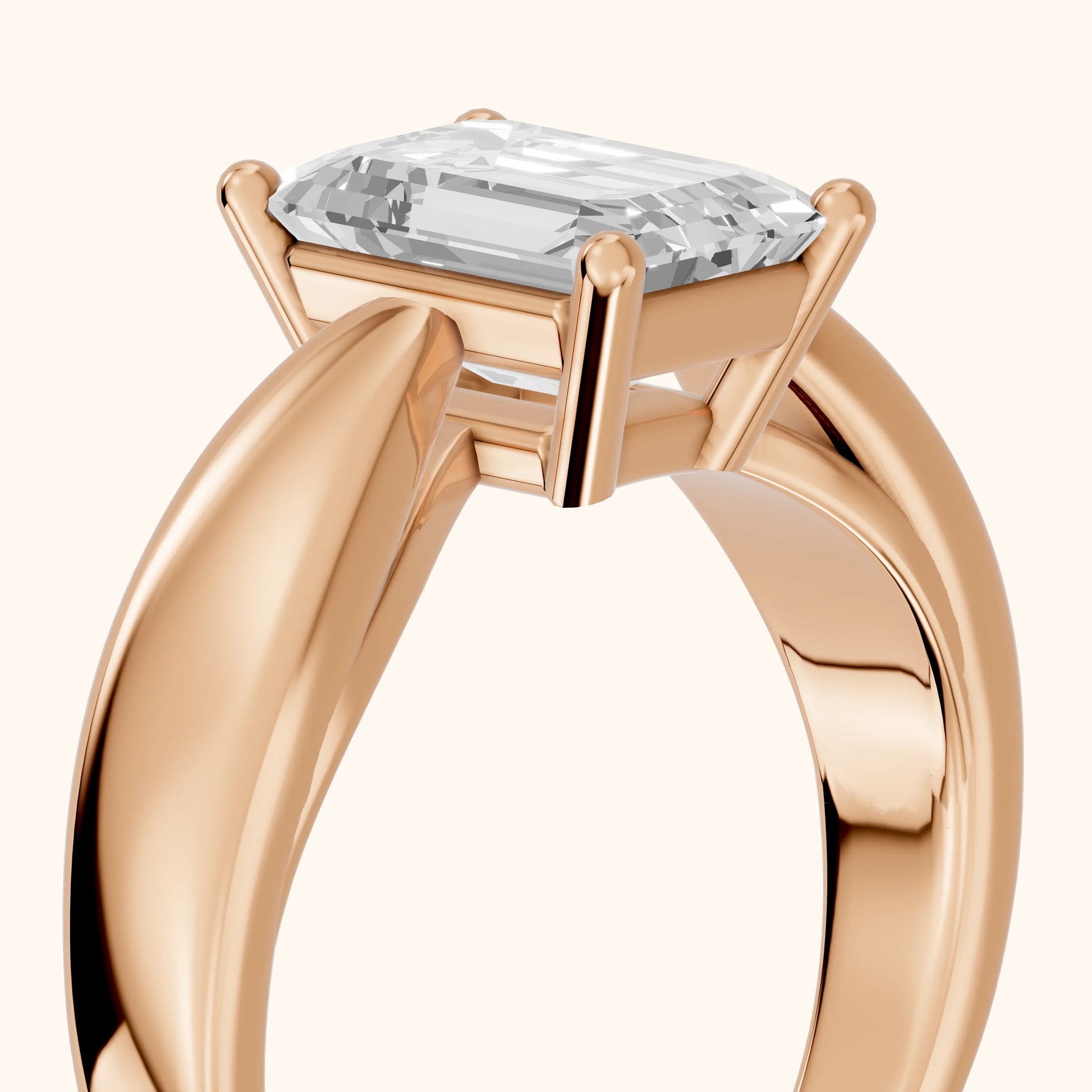 Talia Solitaire Twist Emerald Diamond Engagement Ring in Rose Gold - slant-view.webp