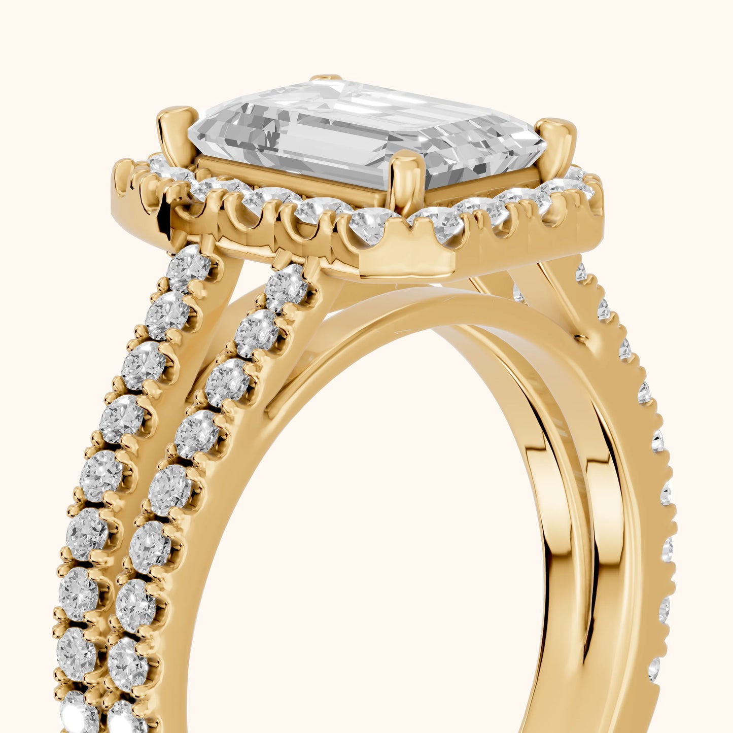 Kira Halo Split Shank Emerald Diamond Engagement Ring in Yellow Gold - slant-view.webp