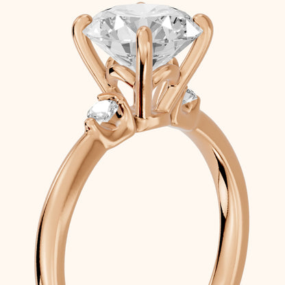 Teodora Floating Three-Stone Round Diamond Engagement Ring in Rose Gold - slant-view.webp