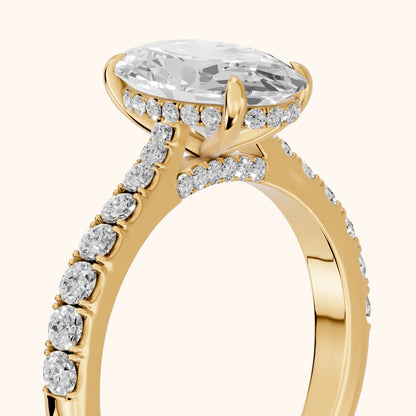 Gia Hidden Halo Pavé Oval Diamond Ring in Yellow Gold - slant-view.webp