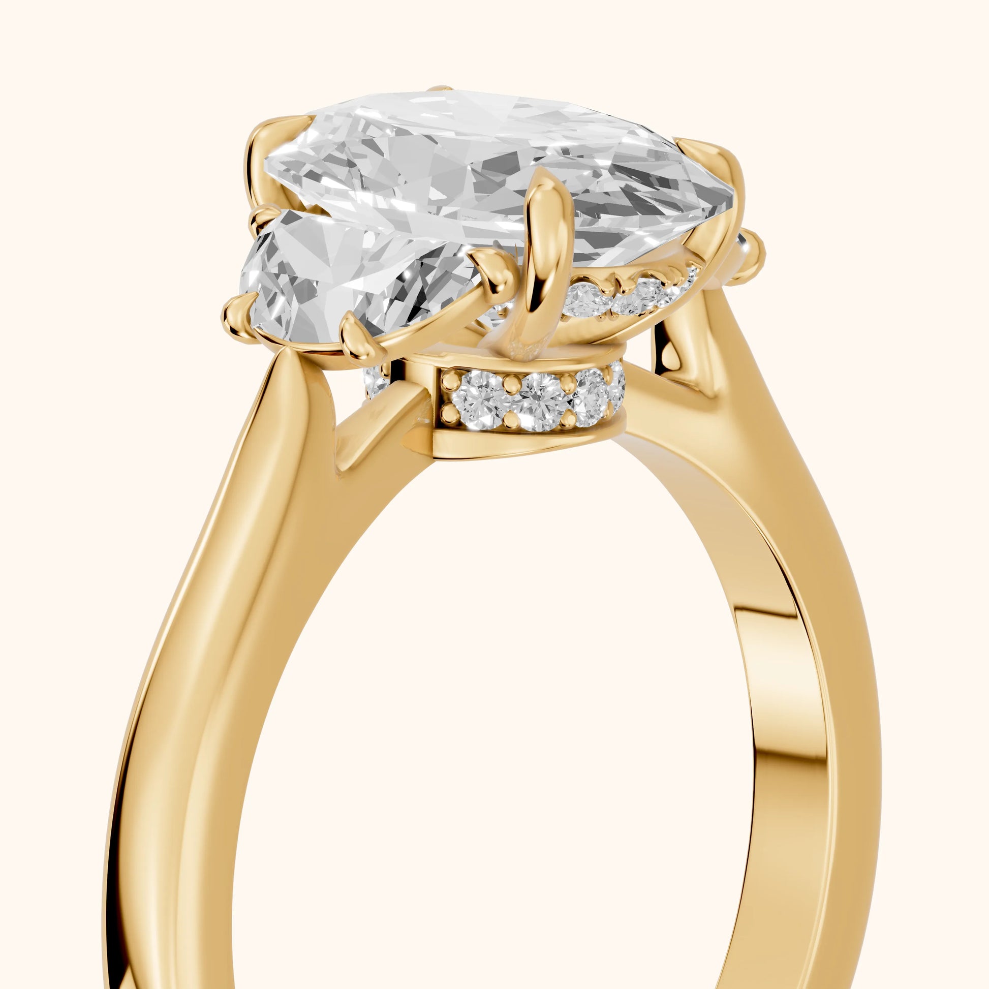 Romy Three-Stone Oval Diamond Engagement Ring in Yellow Gold - slant-view.webp