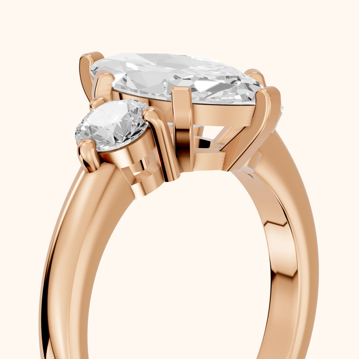 Freesia Three-Stone Marquise Diamond Engagement Ring in Rose Gold - slant-view.webp