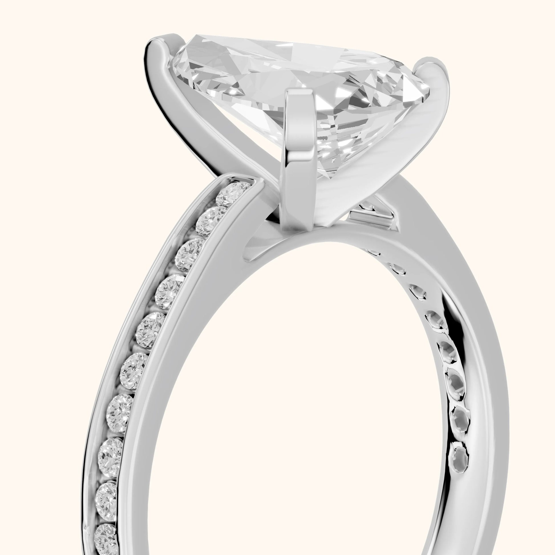 Tessa Solitaire Channel Set Pear Diamond Engagement Ring in White Gold - slant-view.webp
