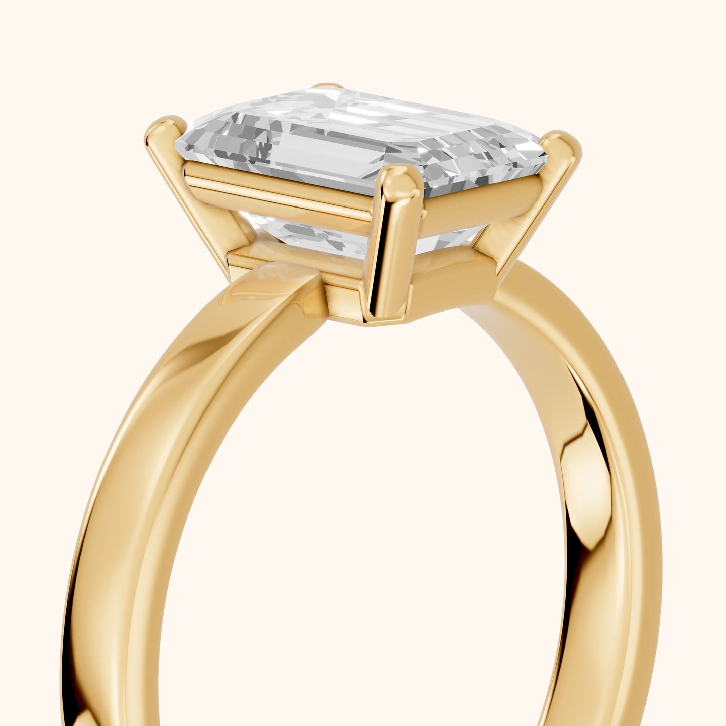 Delia Solitaire Emerald Diamond Engagement Ring in Yellow Gold - slant-view.webp