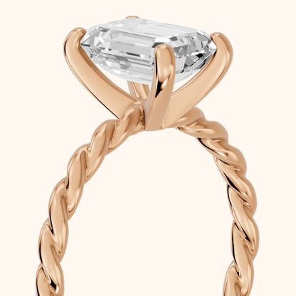 Robyn Twist Solitaire Emerald Diamond Engagement Ring in Rose Gold - slant-view.webp