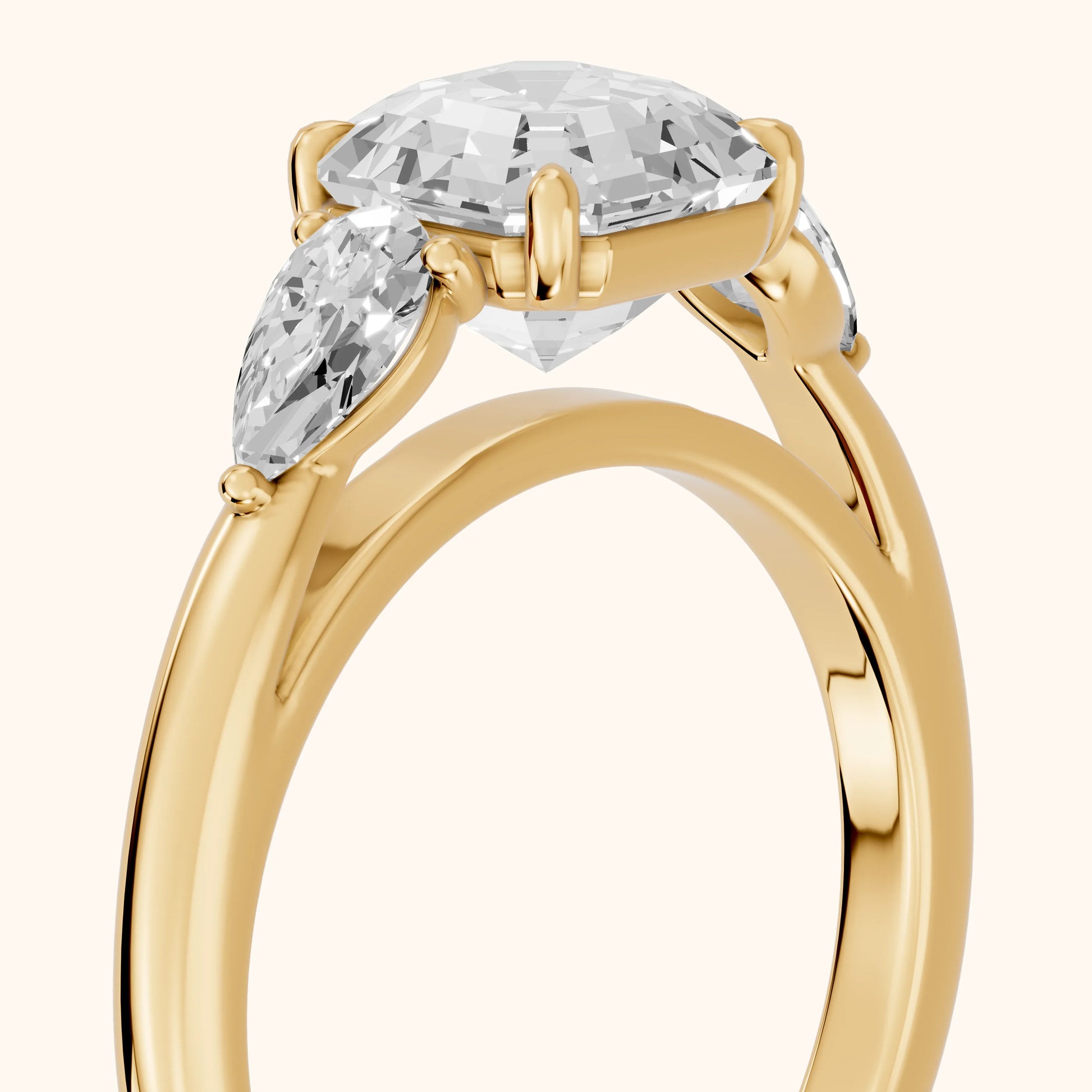 Phoebe Three-Stone Asscher Diamond Ring in Yellow Gold - slant-view.webp